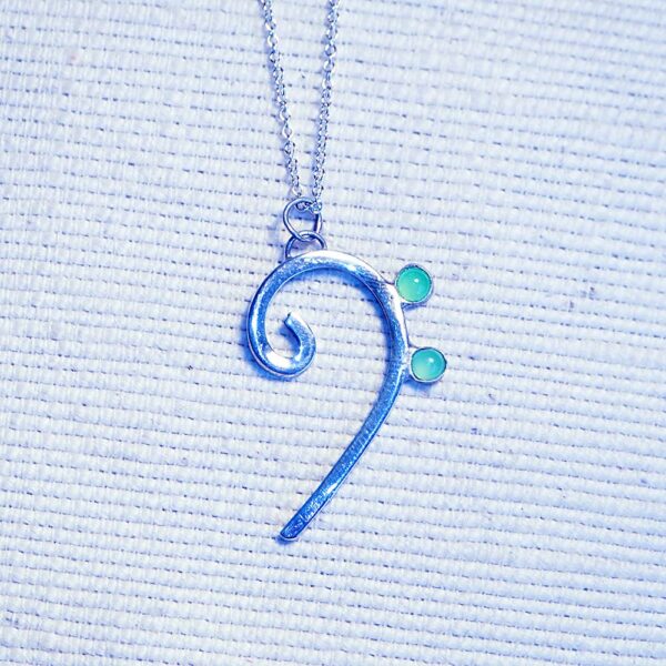 Bass clef necklace with 4mm natural cabochons