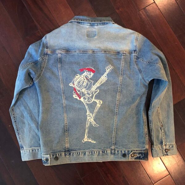 Skeleton Playing Bass on a Denim Jacket