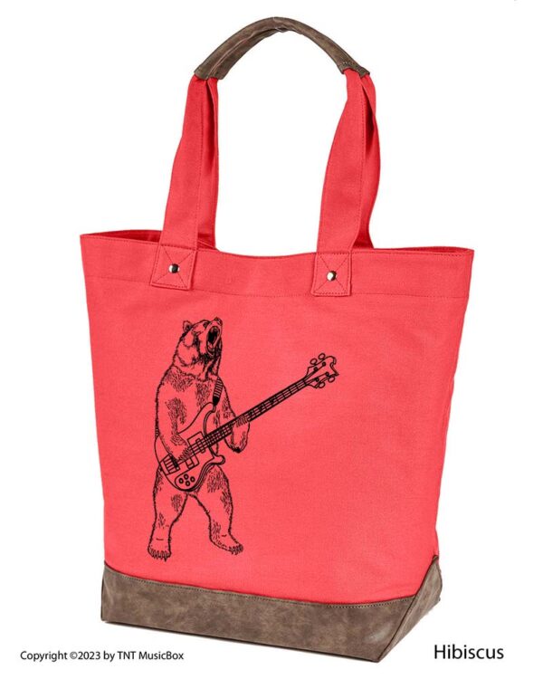 Bear Playing Bass graphic on Hibiscus colored 14oz. canvas tote. Comes Cotton lined with zippered pocket and magnetic snap closure.