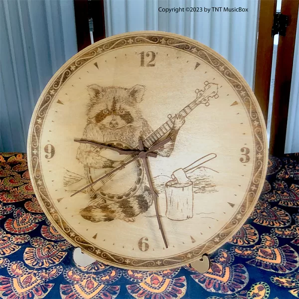 Raccoon Playing Banjo Wall Clock. Laser engraved, 11.25" in diameter. 6mm Baltic Birch.